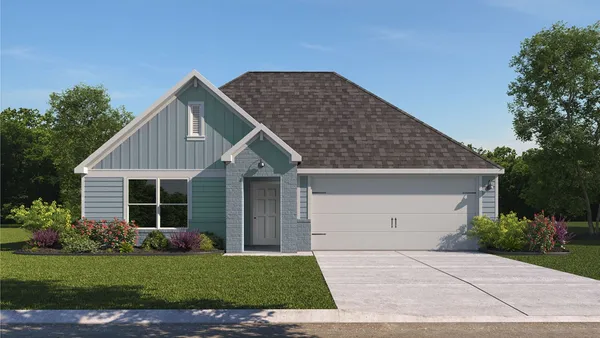 a front view of house with yard and green space