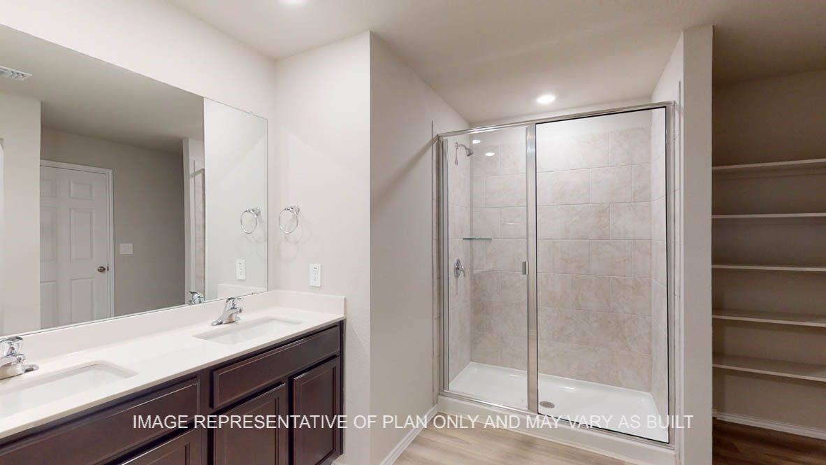 3101 Taddy Road Lorena, TX 76655 - Photo 17 of 27 a bathroom with a shower sink and mirror