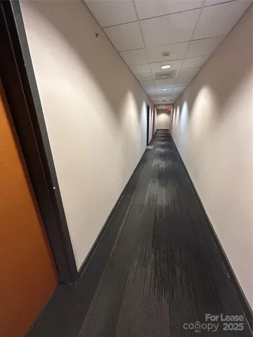 a kitchen with a stove and a refrigerator