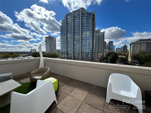 a view of a chairs in a balcony