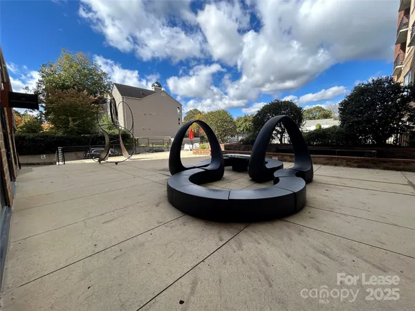 a view of staircase with view of living room