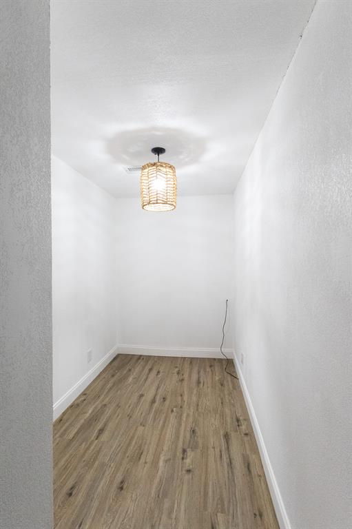 536 Cavin Lane Axtell, TX 76624 - Photo 21 of 40 a view of a room with wooden floor and a window