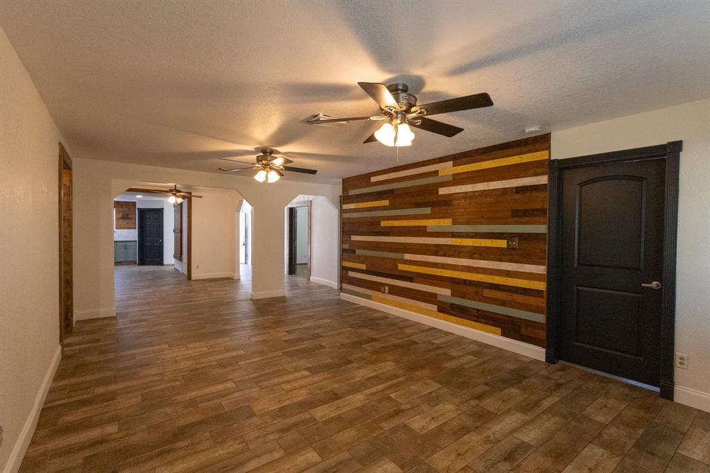 536 Cavin Lane Axtell, TX 76624 - Photo 23 of 40 a view of empty room with wooden floor