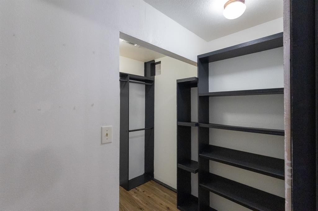 536 Cavin Lane Axtell, TX 76624 - Photo 26 of 40 a view of walk in closet with empty racks