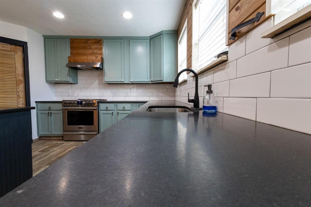 536 Cavin Lane Axtell, TX 76624 - Photo 38 of 40 an empty room with wooden floor and a window