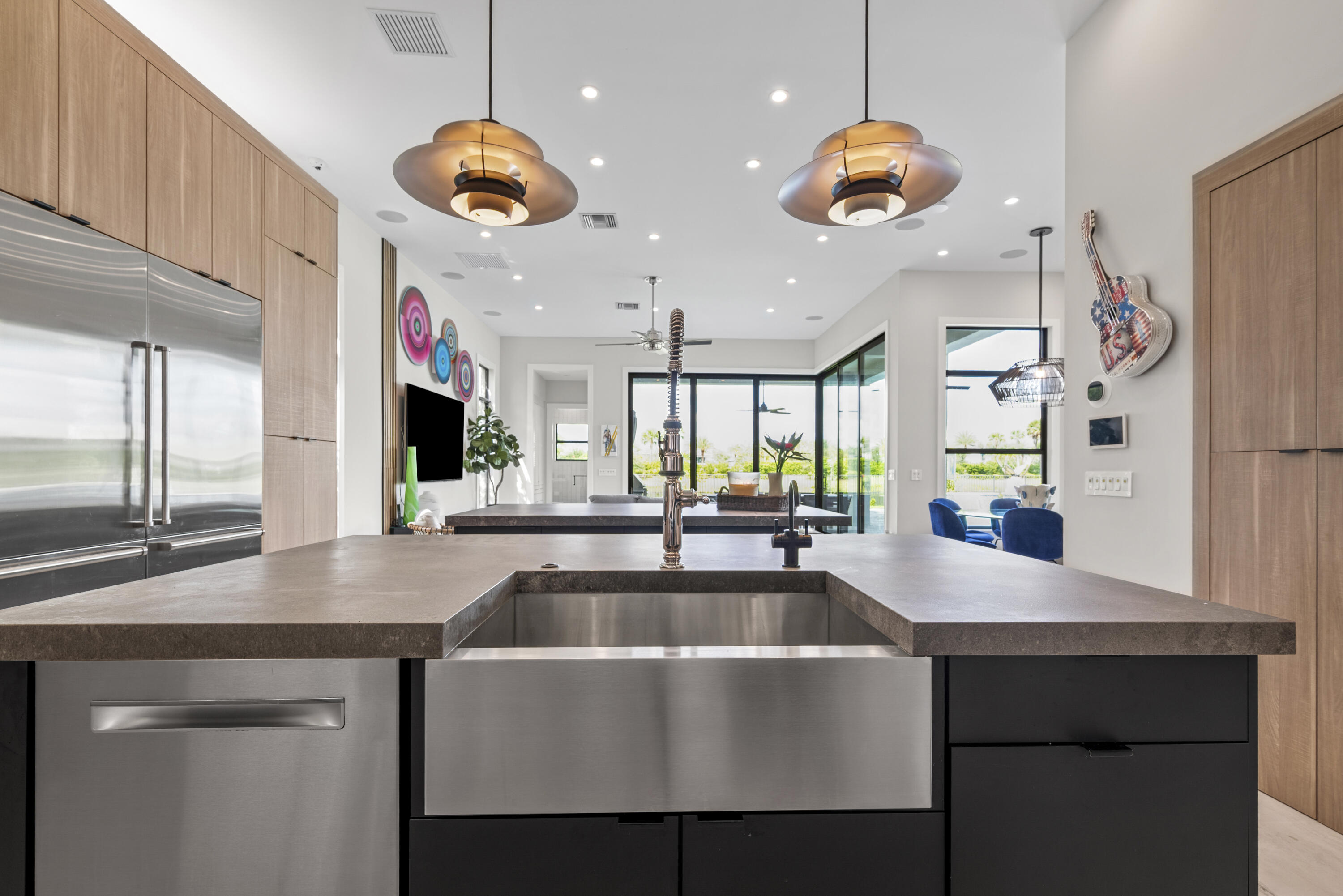 9771 Chianti Classico Terrace Boca Raton, FL 33496 - Photo 26 of 114 a kitchen with stainless steel appliances granite countertop a sink and a wooden floors