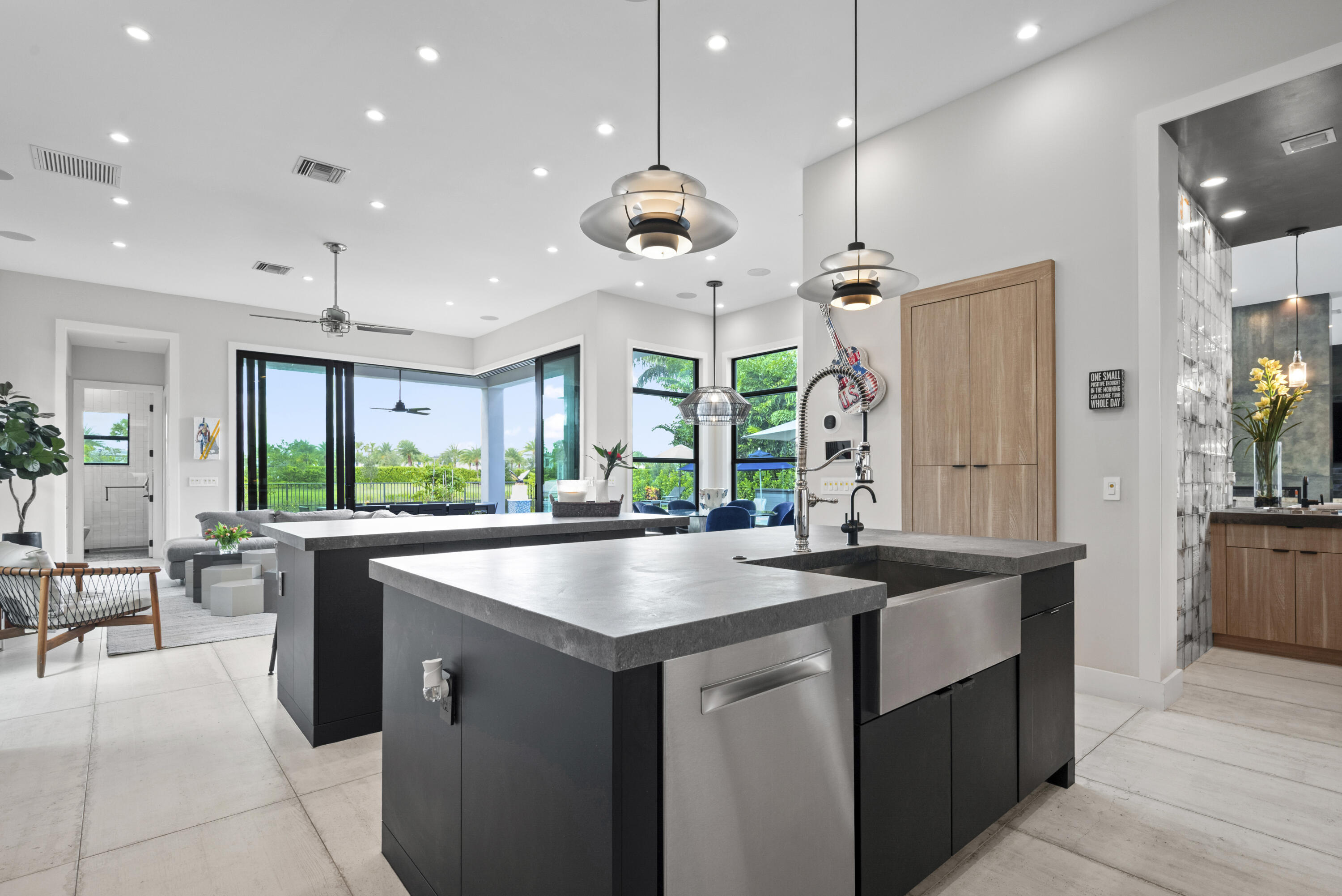 9771 Chianti Classico Terrace Boca Raton, FL 33496 - Photo 27 of 114 a kitchen with stainless steel appliances granite countertop a sink a counter top space and living room view