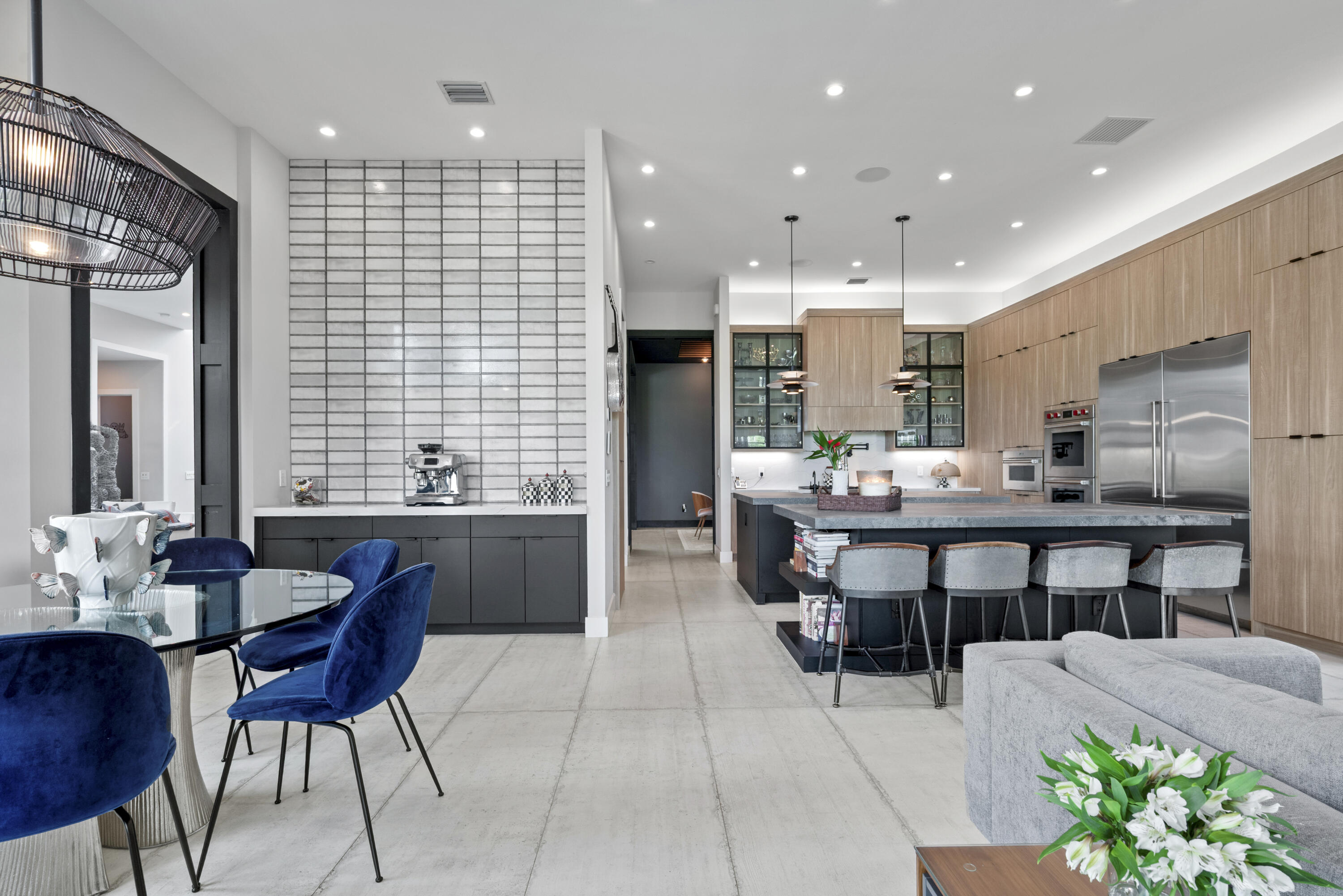 9771 Chianti Classico Terrace Boca Raton, FL 33496 - Photo 30 of 114 a kitchen with a table and chairs in it