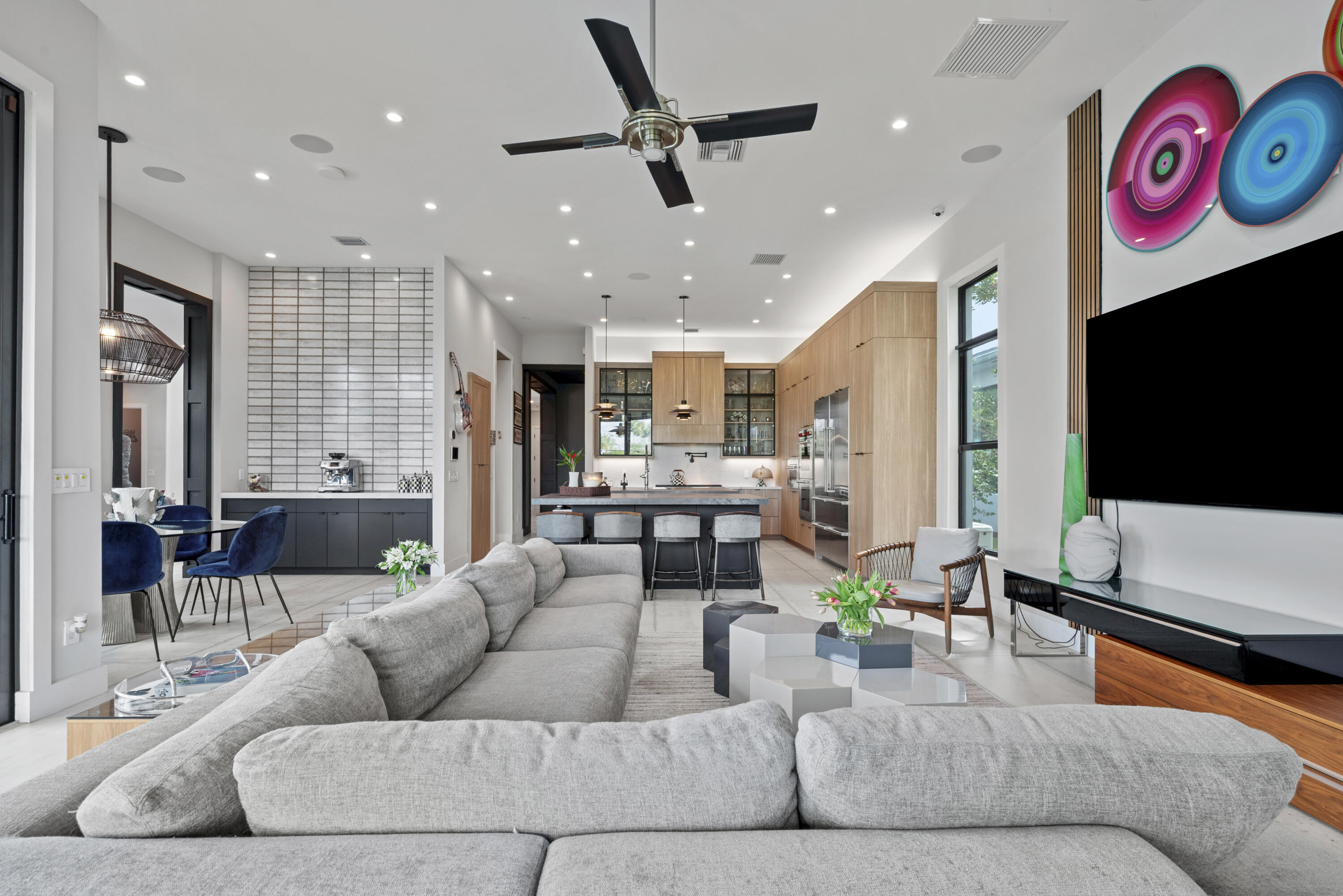 9771 Chianti Classico Terrace Boca Raton, FL 33496 - Photo 34 of 114 a living room with furniture kitchen view and a large window