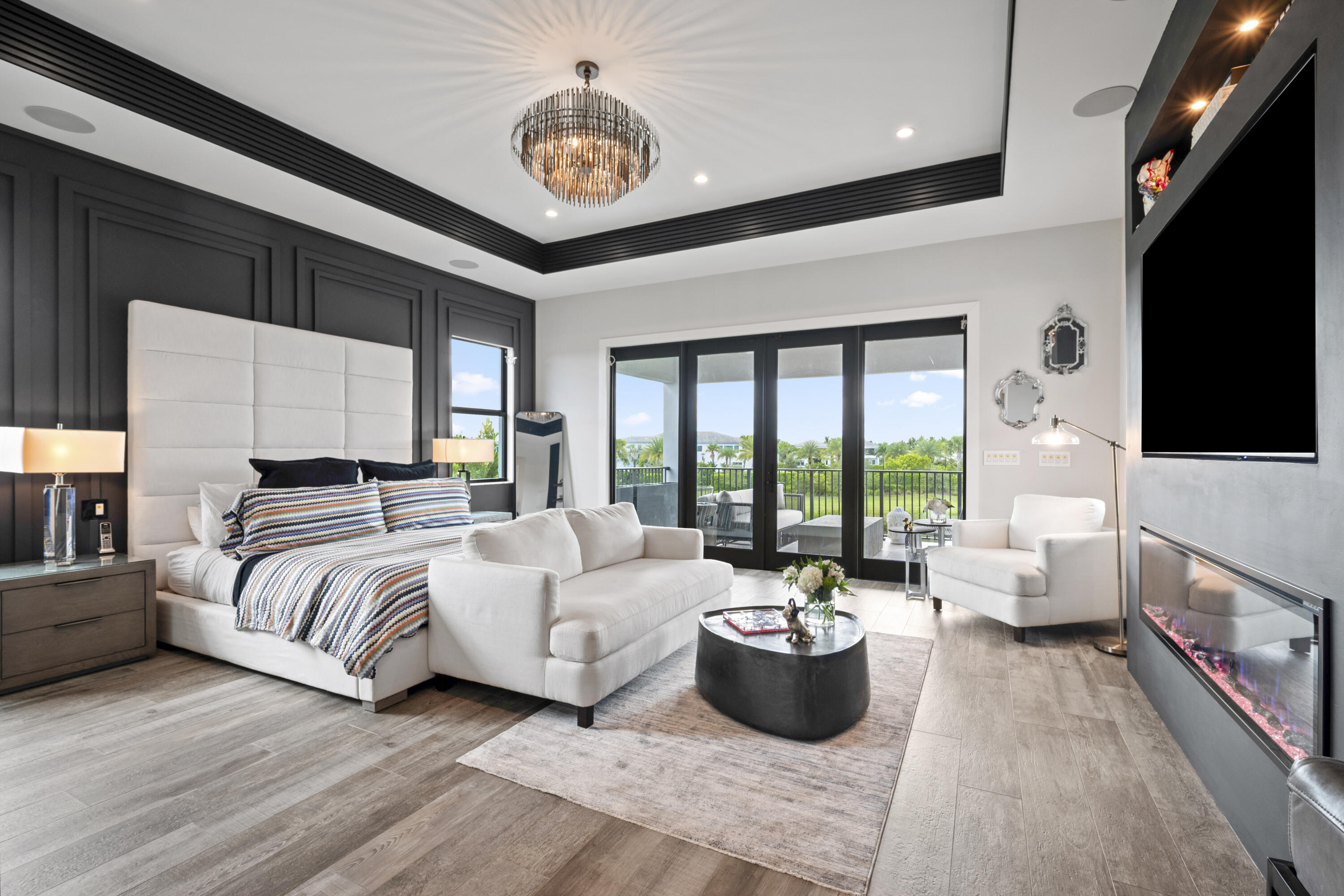 9771 Chianti Classico Terrace Boca Raton, FL 33496 - Photo 52 of 114 a living room with furniture fireplace and flat screen tv