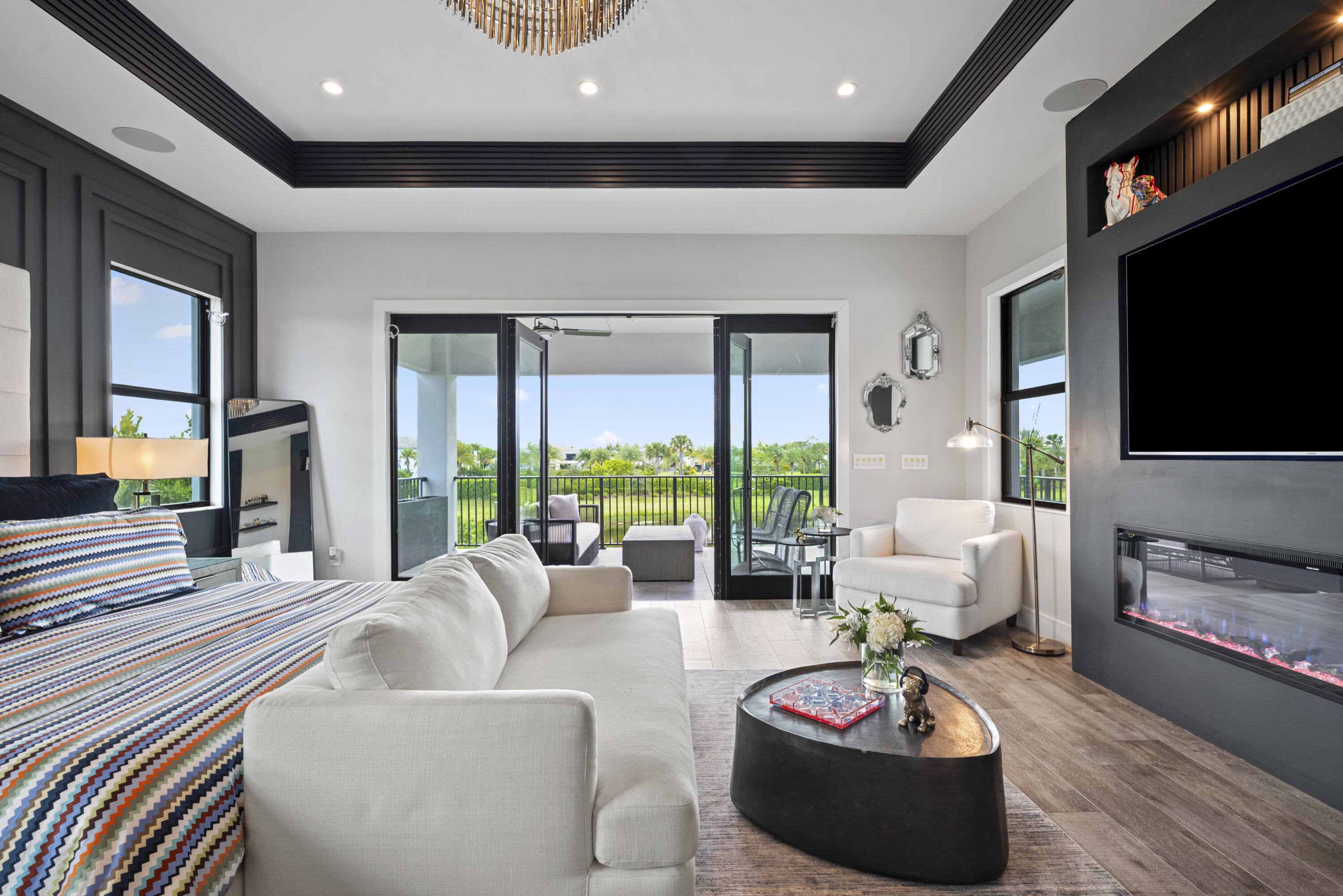 9771 Chianti Classico Terrace Boca Raton, FL 33496 - Photo 55 of 114 a living room with furniture and a flat screen tv