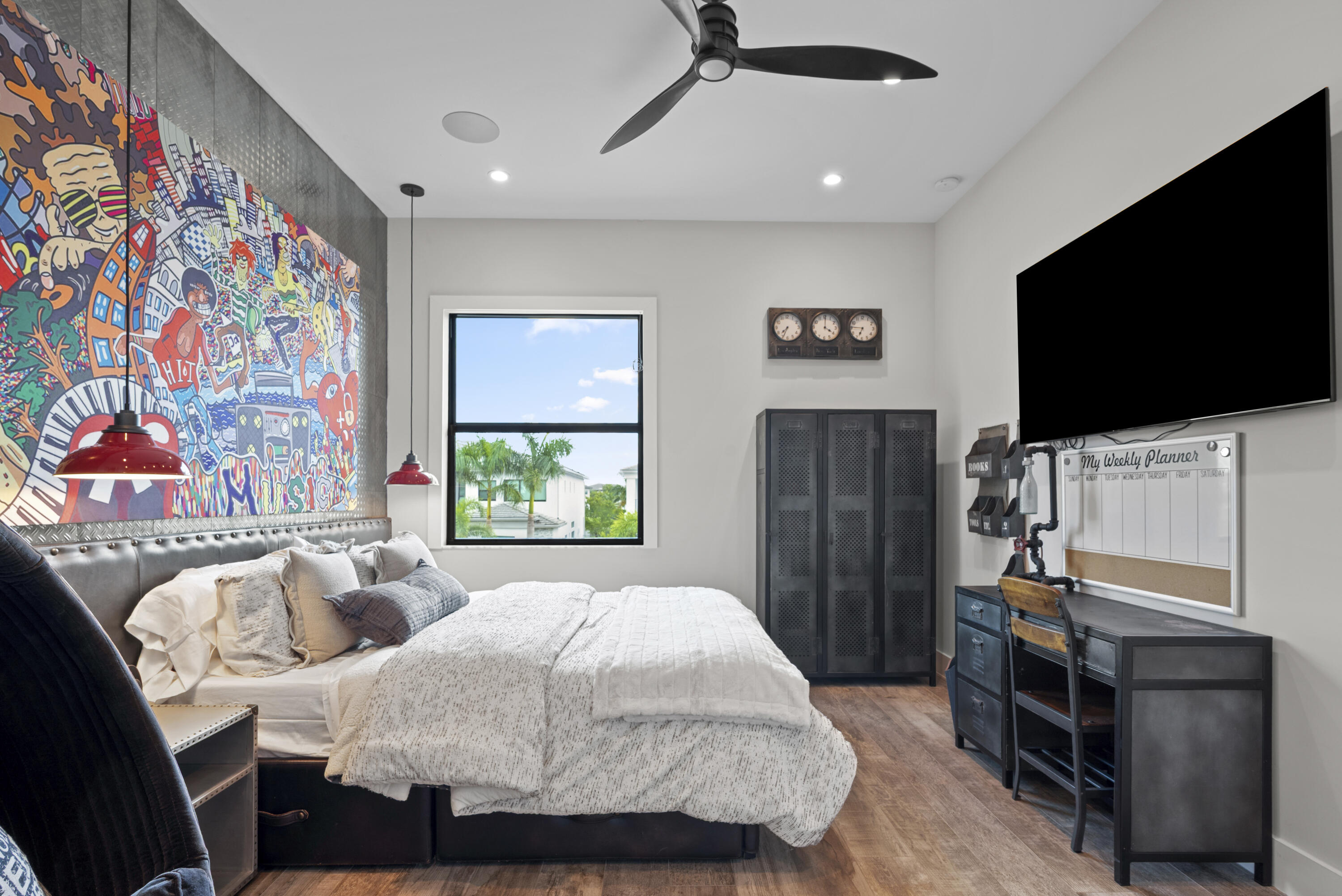 9771 Chianti Classico Terrace Boca Raton, FL 33496 - Photo 73 of 114 a bedroom with furniture and a flat screen tv