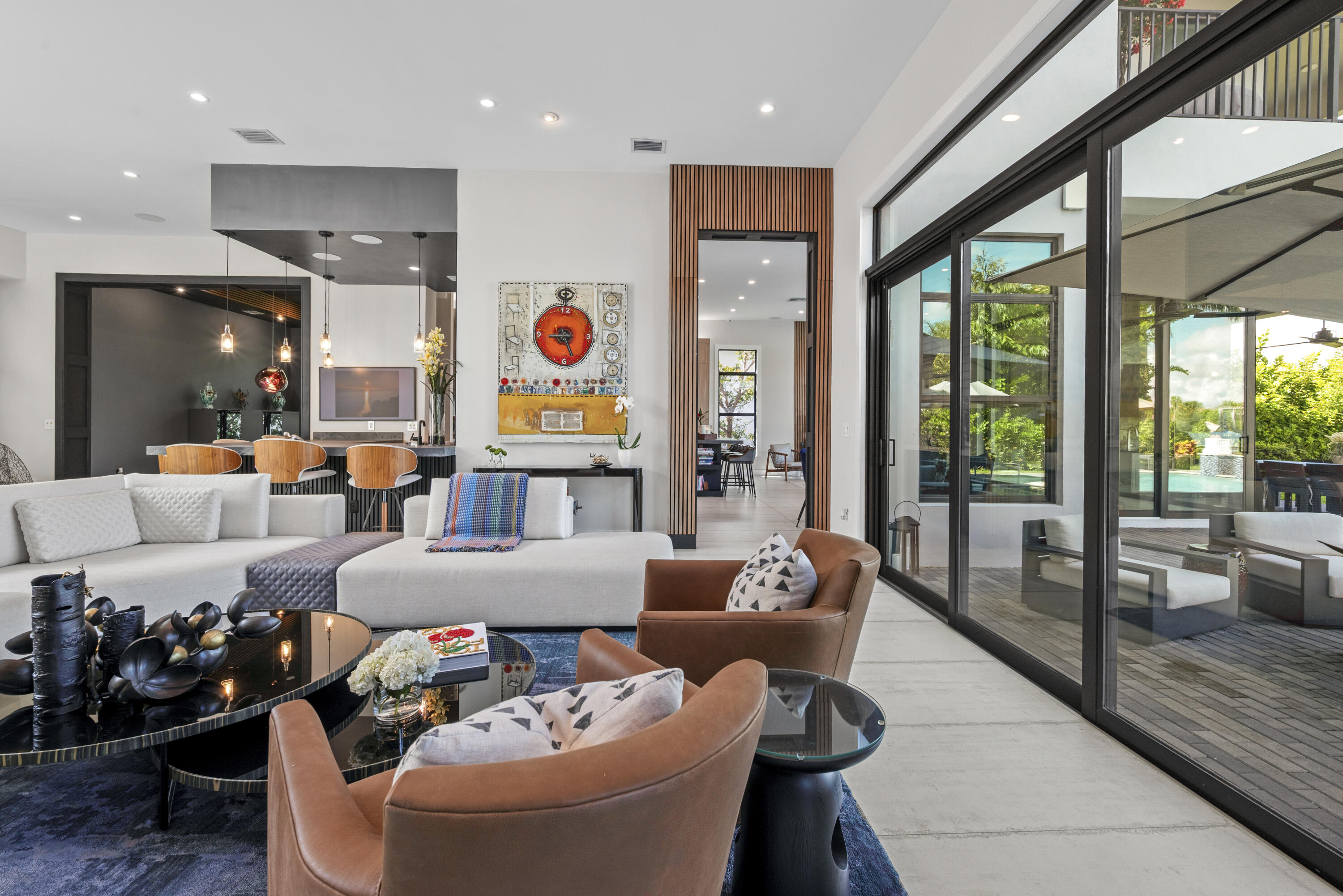 9771 Chianti Classico Terrace Boca Raton, FL 33496 - Photo 9 of 114 a living room filled with furniture and a floor to ceiling window