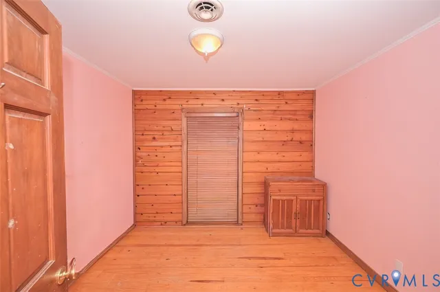 a view of a hallway with closet