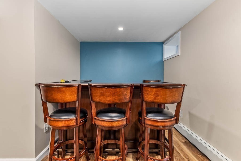 18 Greensboro Road Dedham, MA 02026 - Photo 27 of 39 a balcony with table and chairs
