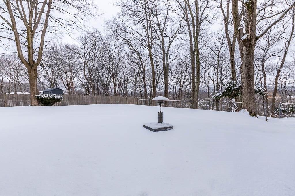 18 Greensboro Road Dedham, MA 02026 - Photo 34 of 39 a view of outside space with trees