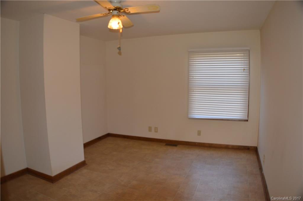 116 Cove Road Rutherfordton, NC 28139 - Photo 14 of 16 an empty room with a window