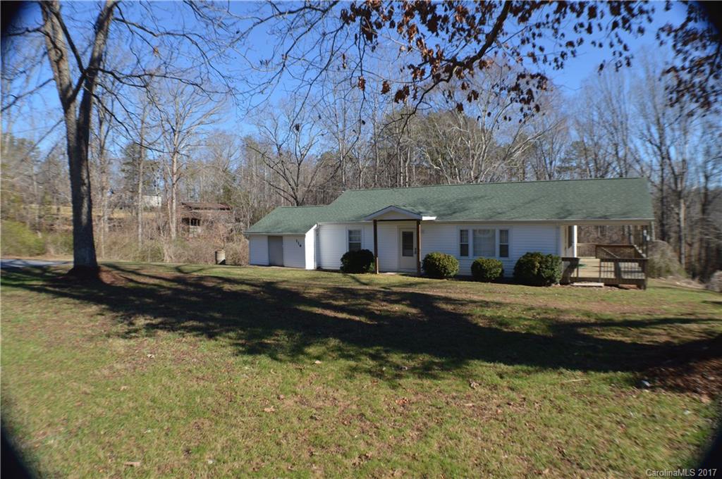 116 Cove Road Rutherfordton, NC 28139 - Photo 5 of 16 a front view of house with yard and trees