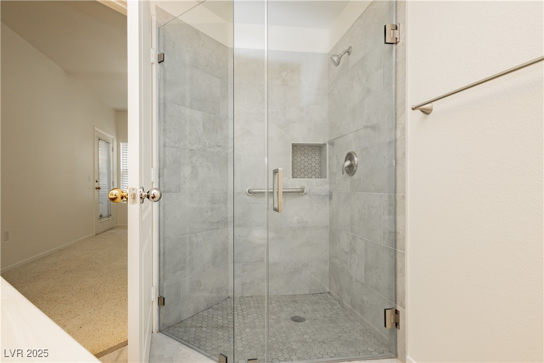 7400 West Flamingo Road, Unit 1033 Las Vegas, NV 89147 - Photo 4 of 29 Custom Shower with Spa Glass and Zero threshold, new tile floor and toilet
