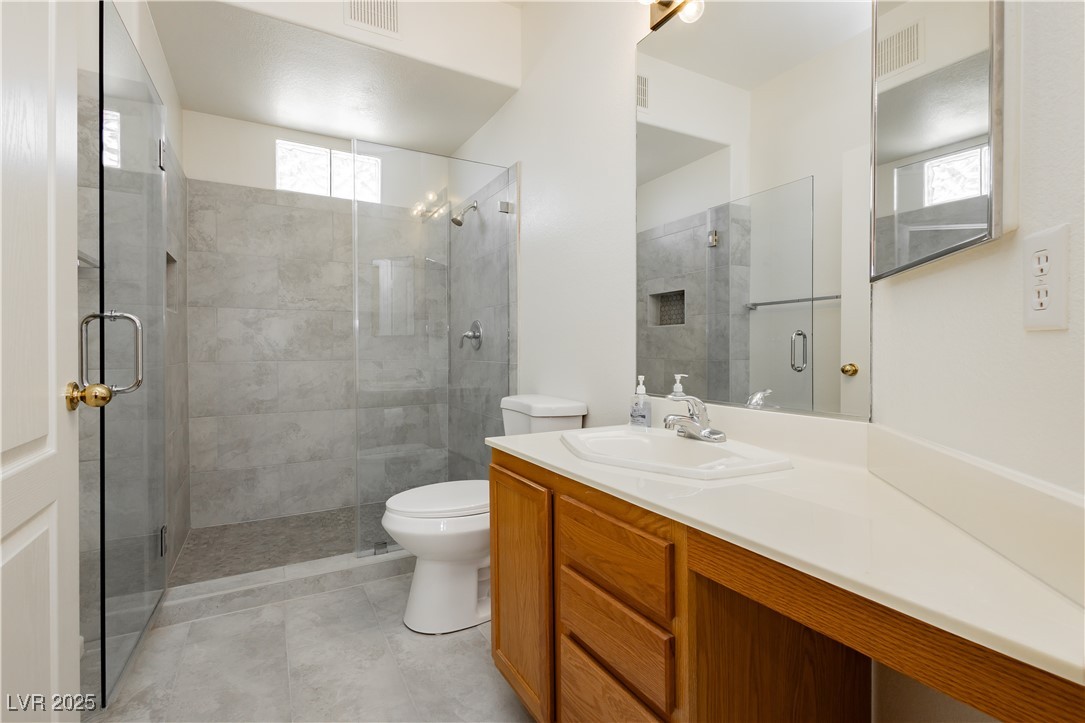 7400 West Flamingo Road, Unit 1033 Las Vegas, NV 89147 - Photo 9 of 29 Custom Shower, new tile floors and toilet