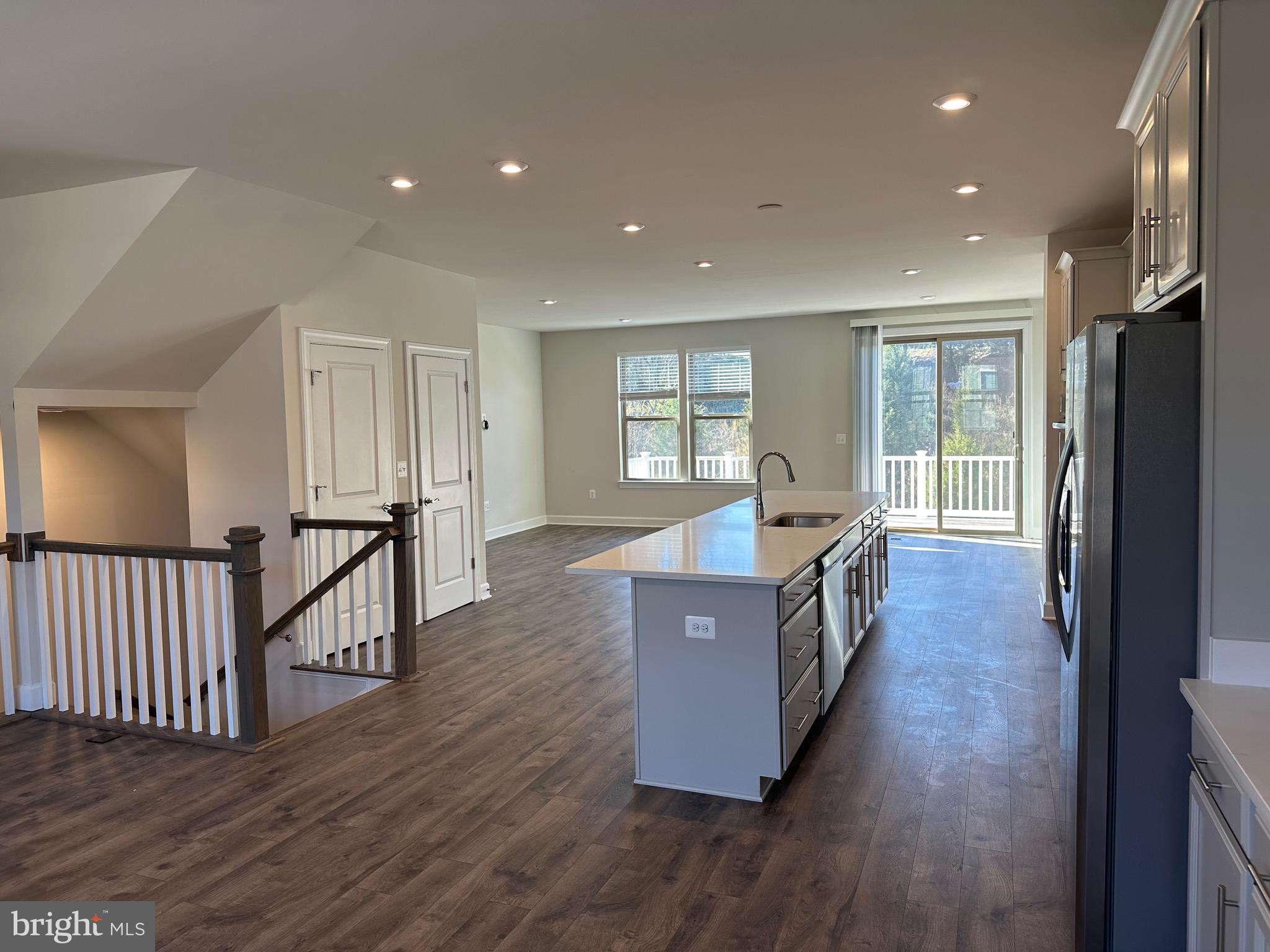 9886 Hopkins Loop Manassas, VA 20110 - Photo 12 of 50 a living room with furniture and a wooden floor