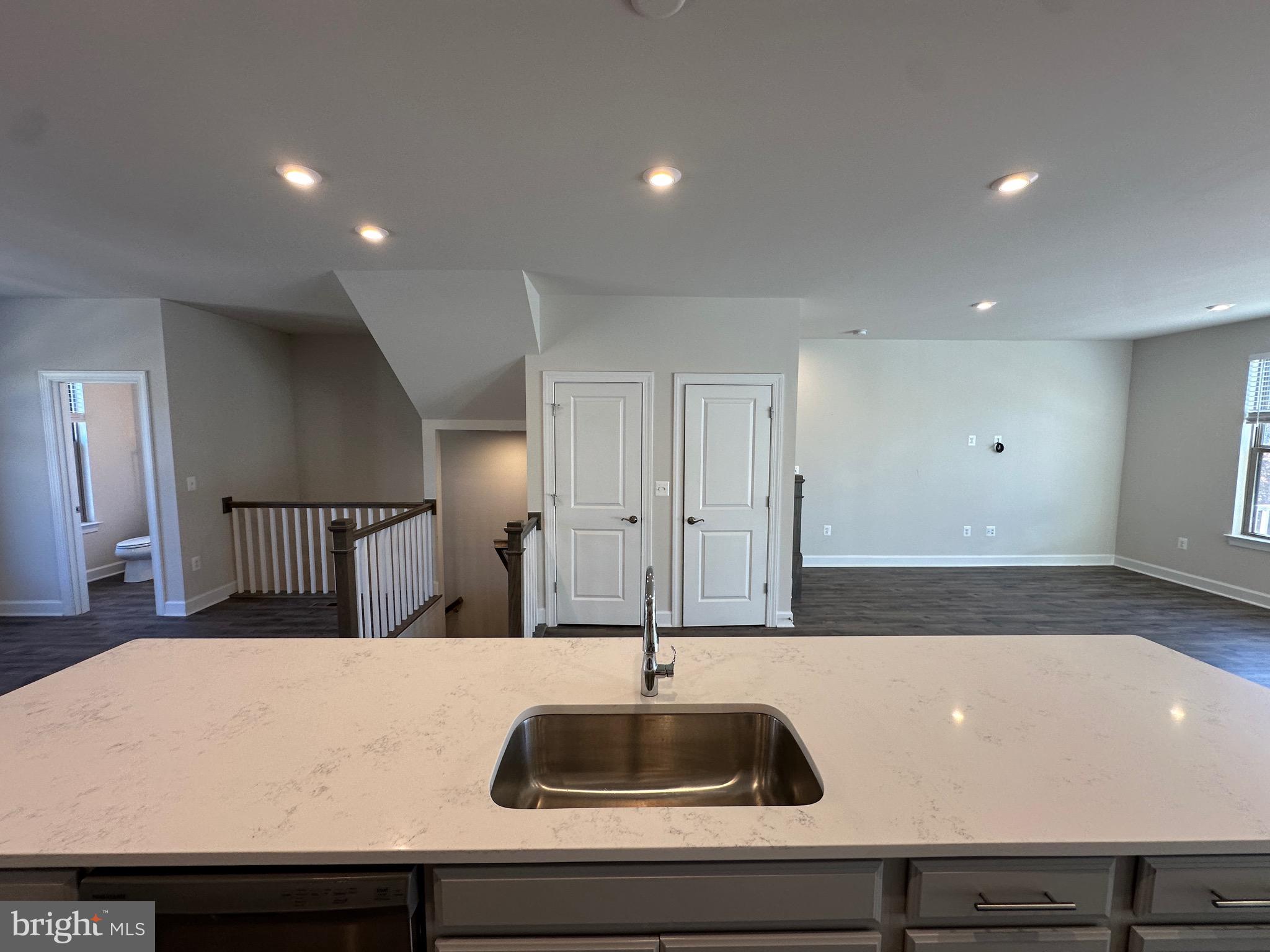 9886 Hopkins Loop Manassas, VA 20110 - Photo 16 of 50 a view of a kitchen counter top a sink and appliances