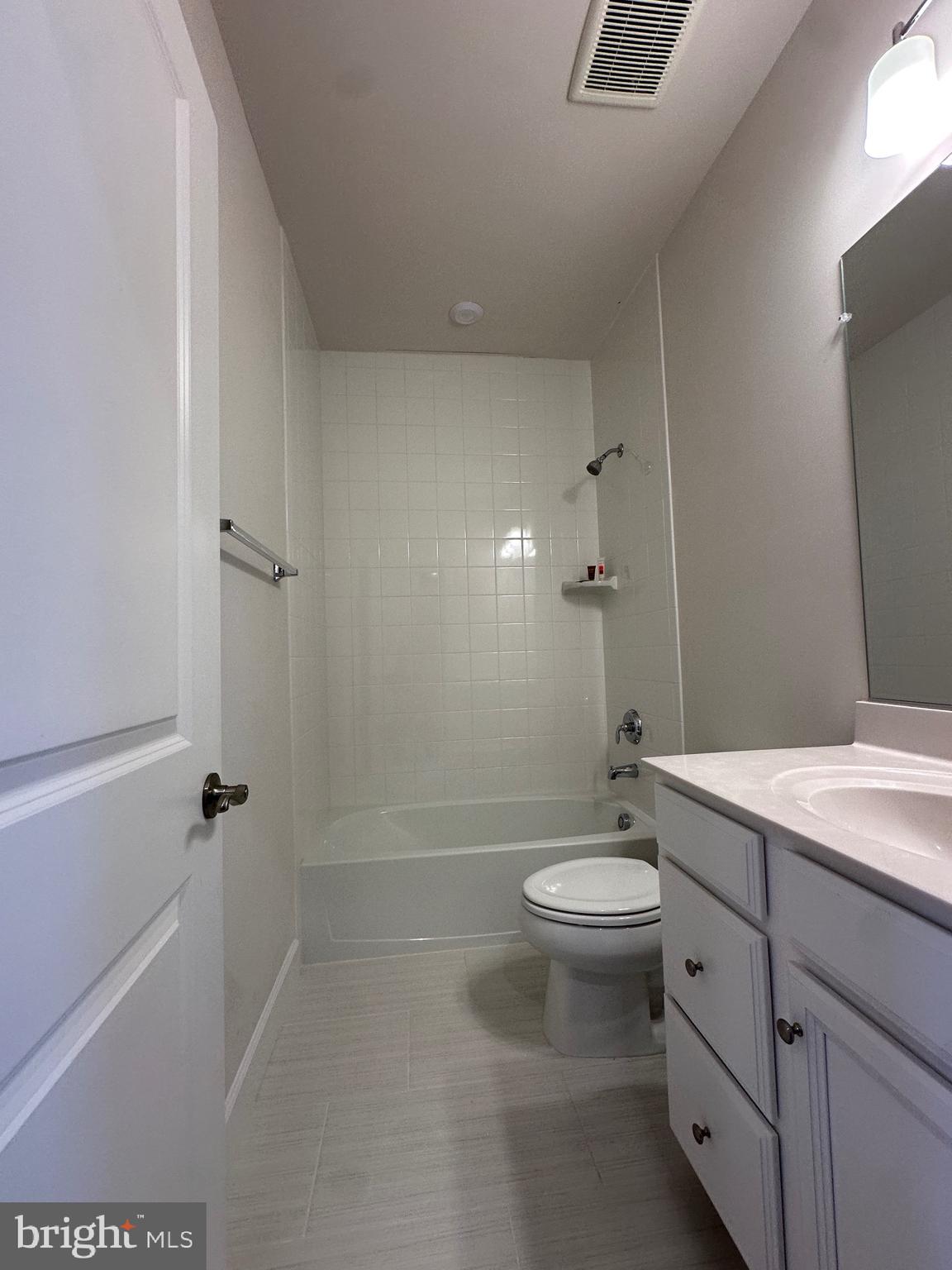 9886 Hopkins Loop Manassas, VA 20110 - Photo 26 of 50 a bathroom with a sink a toilet and shower