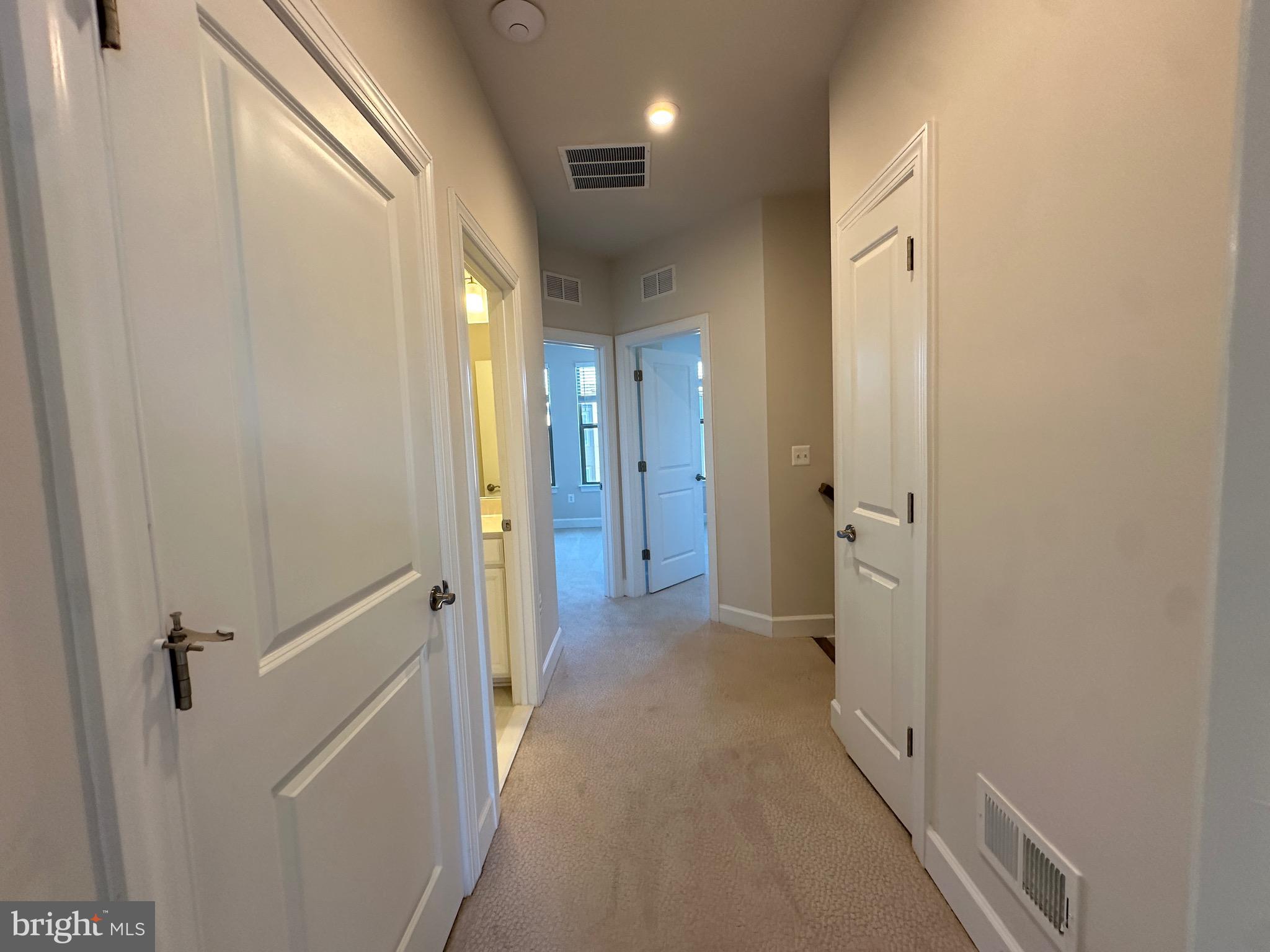 9886 Hopkins Loop Manassas, VA 20110 - Photo 38 of 50 a view of a hallway with a room