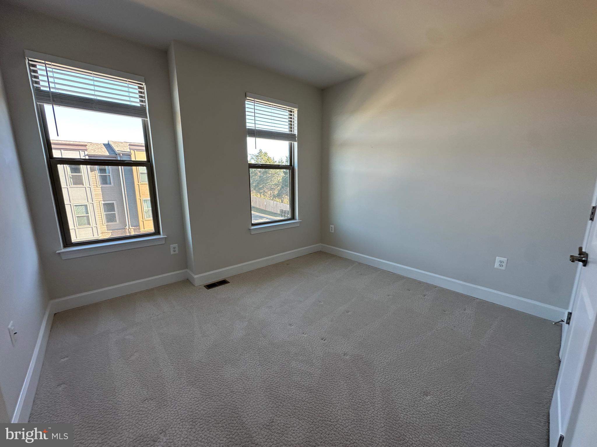 9886 Hopkins Loop Manassas, VA 20110 - Photo 41 of 50 an empty room with windows