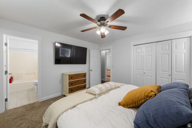 664 East Springhill Drive Washington, UT 84780 - Photo 14 of 21 Carpeted bedroom featuring a ceiling fan with wood-finish blades and integrated lighting