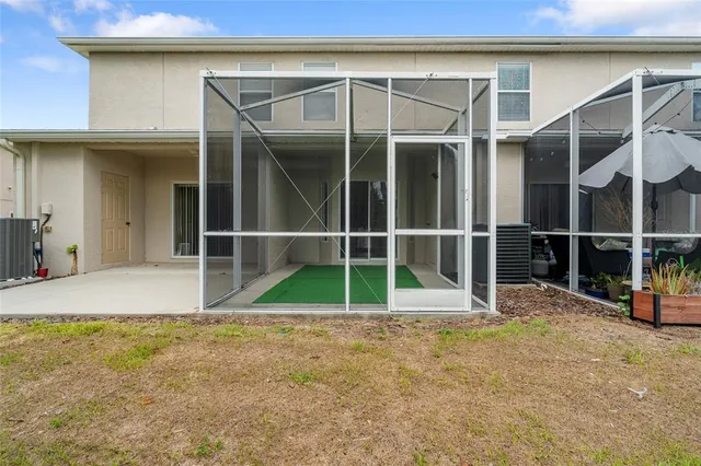 a house with trees in the background