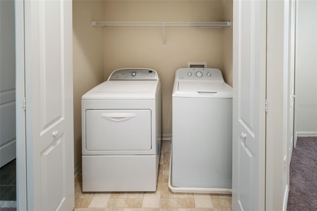 15929 Fishhawk Creek Lane Lithia, FL 33547 - Photo 6 of 25 a utility room with dryer and washer