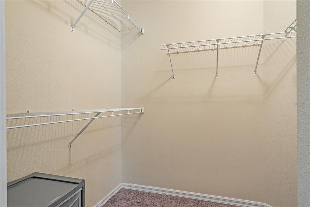15929 Fishhawk Creek Lane Lithia, FL 33547 - Photo 7 of 25 a view of a room with racks on the wall