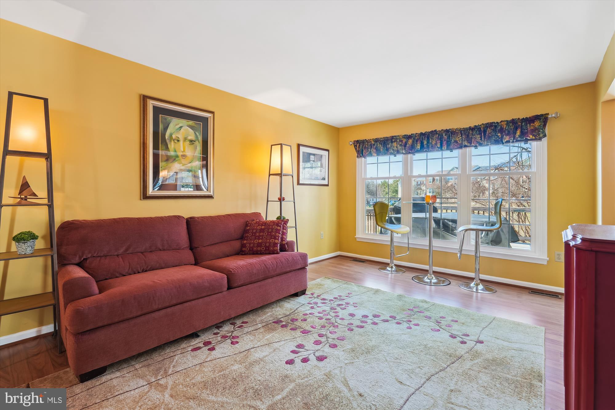 2917 Gracefield Road Silver Spring, MD 20904 - Photo 16 of 51 a living room with furniture and a gate