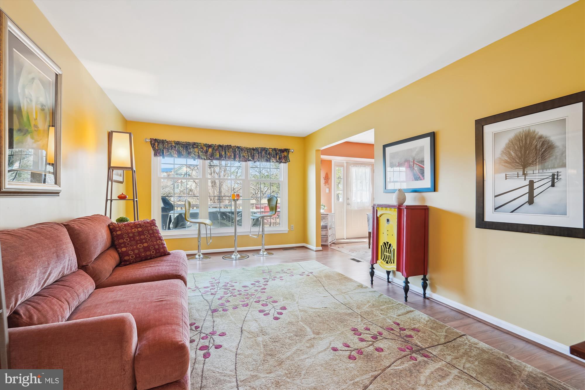2917 Gracefield Road Silver Spring, MD 20904 - Photo 17 of 51 a living room with furniture and a floor to ceiling window
