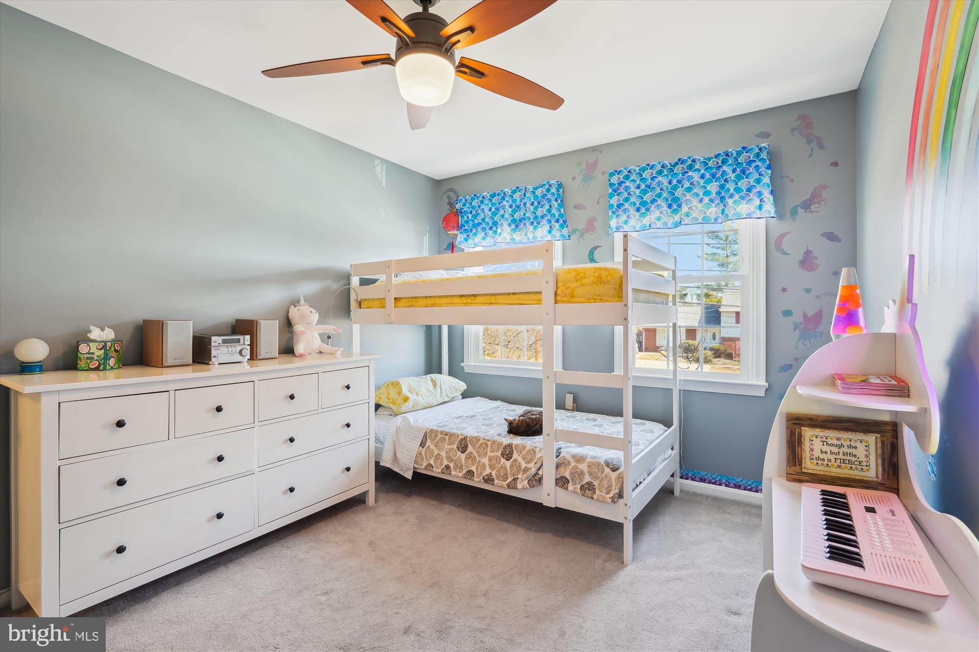 2917 Gracefield Road Silver Spring, MD 20904 - Photo 29 of 51 a bedroom with a bed and a chandelier