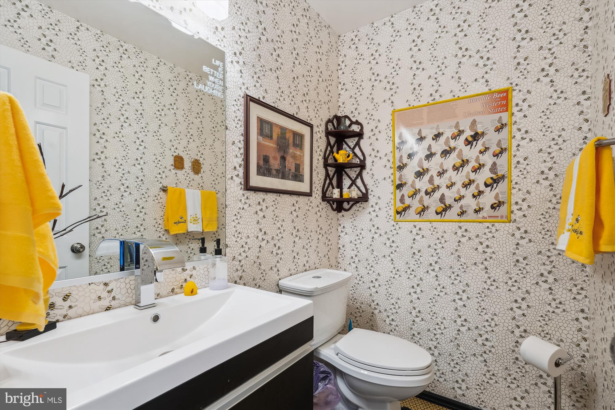2917 Gracefield Road Silver Spring, MD 20904 - Photo 34 of 51 a bathroom with a sink and a mirror