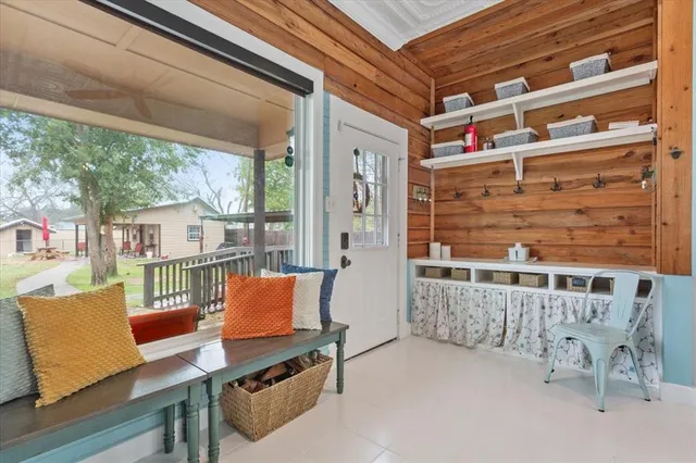 a outdoor living space with furniture and a fireplace