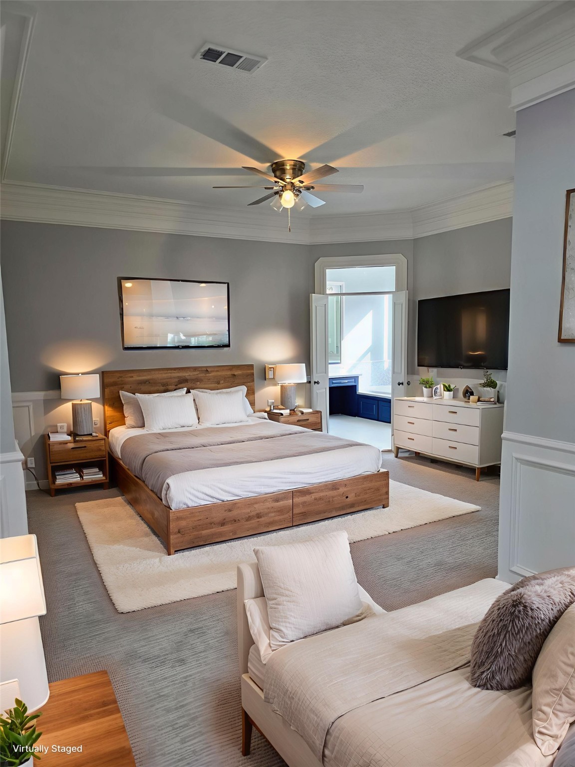 18489 Country Pl Drive Conroe, TX 77302 - Photo 19 of 50 a bedroom with a large bed and a flat screen tv