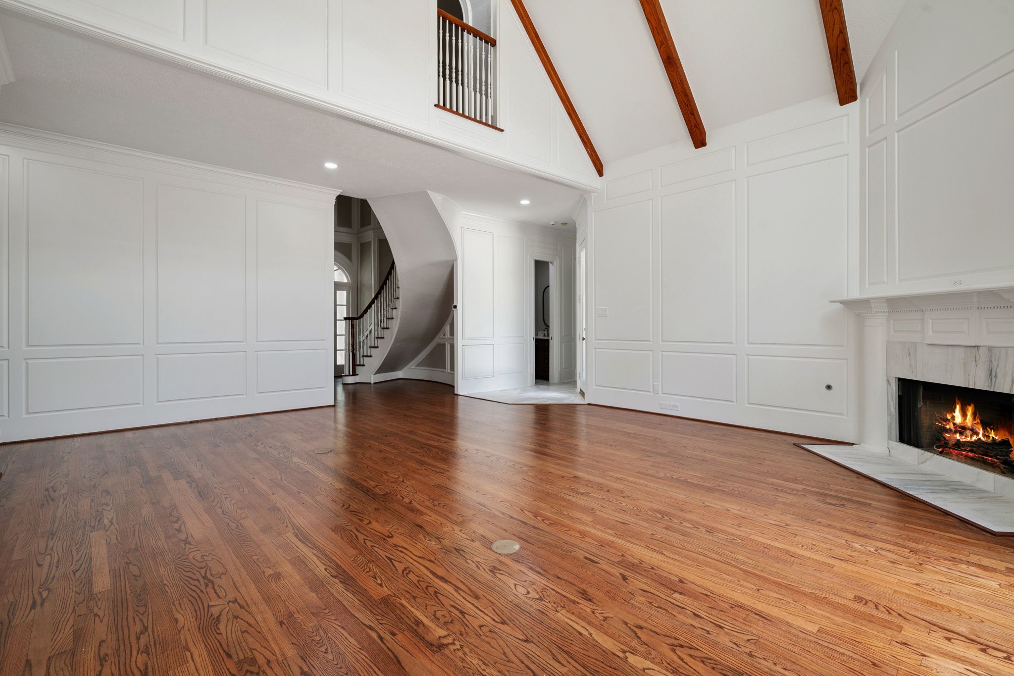 18489 Country Pl Drive Conroe, TX 77302 - Photo 10 of 50 a view of empty room with wooden floor and fireplace