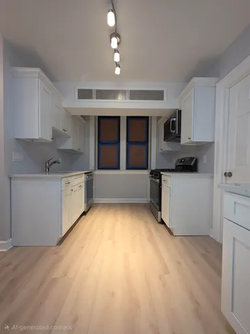 a kitchen with stainless steel appliances granite countertop a stove and a sink