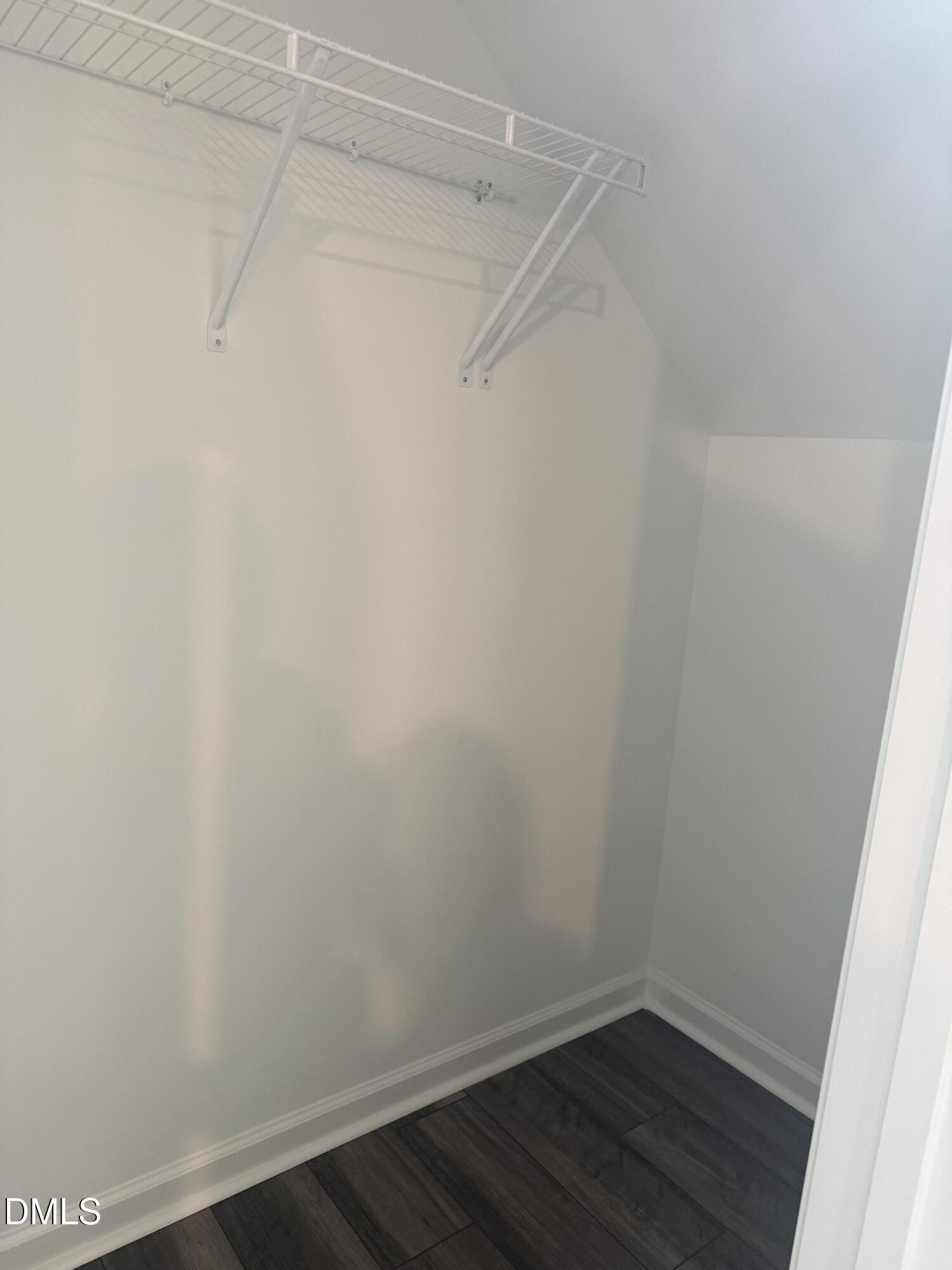 1028 Red Finch Way Angier, NC 27501 - Photo 9 of 50 a view of a room with wooden floor