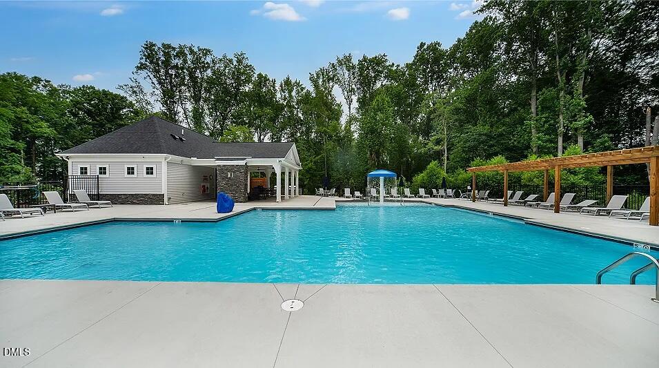 1028 Red Finch Way Angier, NC 27501 - Photo 46 of 50 a house view with swimming pool and sitting space