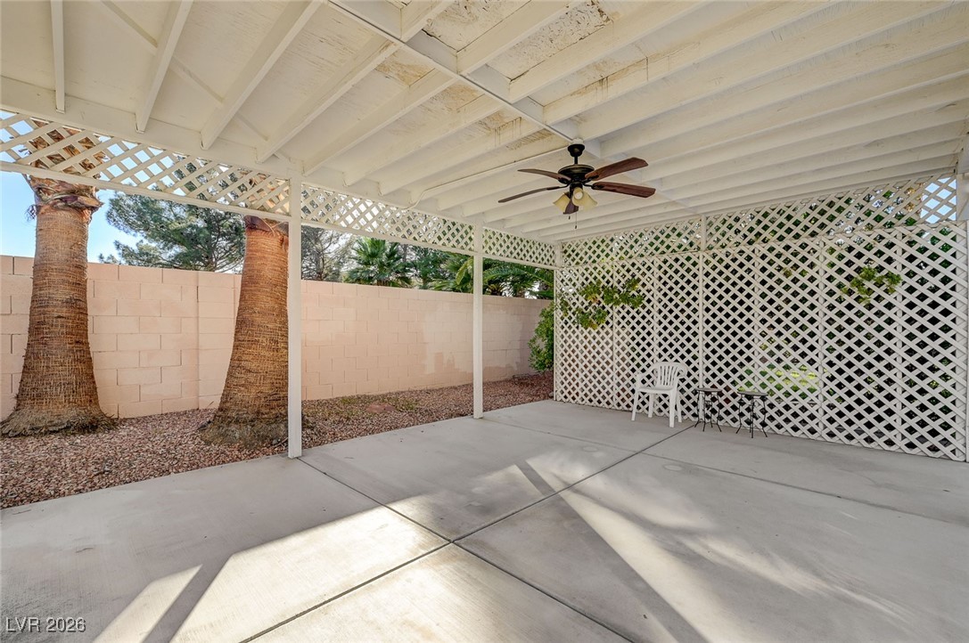 2955 El Camino Road Las Vegas, NV 89146 - Photo 83 of 99 Fenced backyard featuring a ceiling fan and a patio
