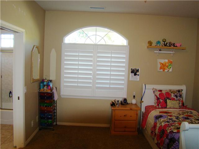 3083 Dos Lomas Fallbrook, CA 92028 - Photo 10 of 16 All four bedrooms have plantation shutters and most have leaded glass accents.