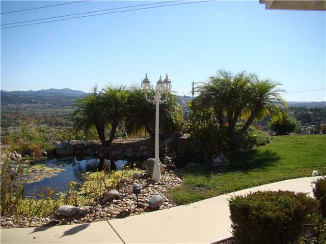 3083 Dos Lomas Fallbrook, CA 92028 - Photo 11 of 16 A cool pond adds to the tranquil feel here.