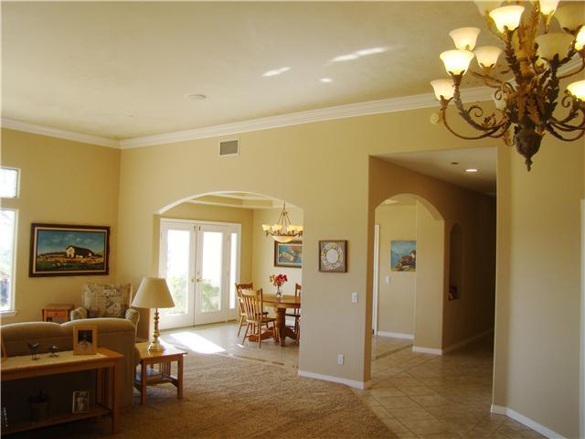 3083 Dos Lomas Fallbrook, CA 92028 - Photo 4 of 16 Custom tile floors with granite inserts throughout the house.