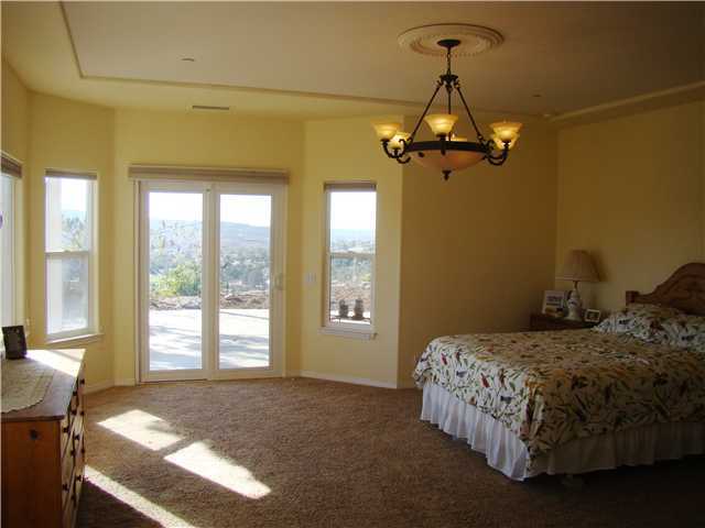 3083 Dos Lomas Fallbrook, CA 92028 - Photo 8 of 16 The master suite has its own walk-out door and plenty of windows.
