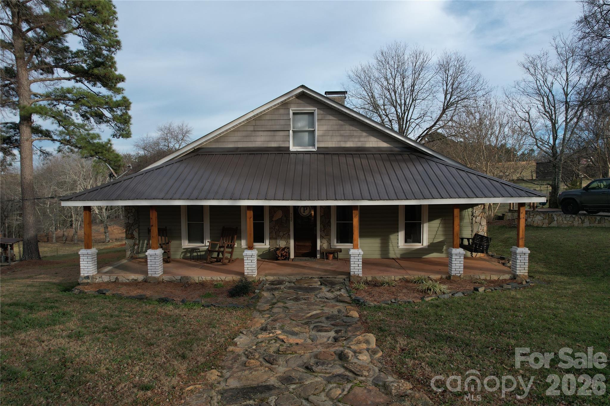 740 Moriah Church Road Casar, NC 28020 - Photo 1 of 31 a front view of a house with patio