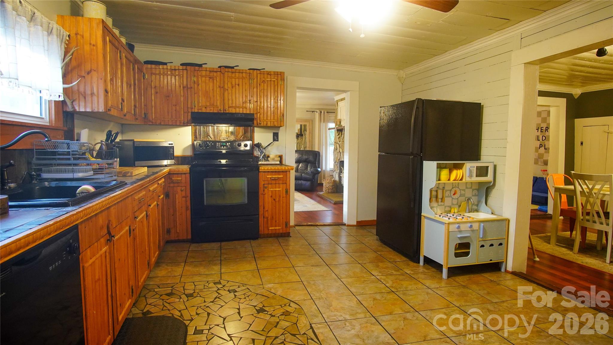 740 Moriah Church Road Casar, NC 28020 - Photo 14 of 31 a kitchen with stainless steel appliances granite countertop a refrigerator and a stove